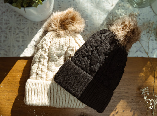 black and tan beanie with pom