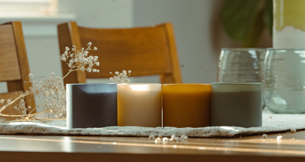 4 candles on a table